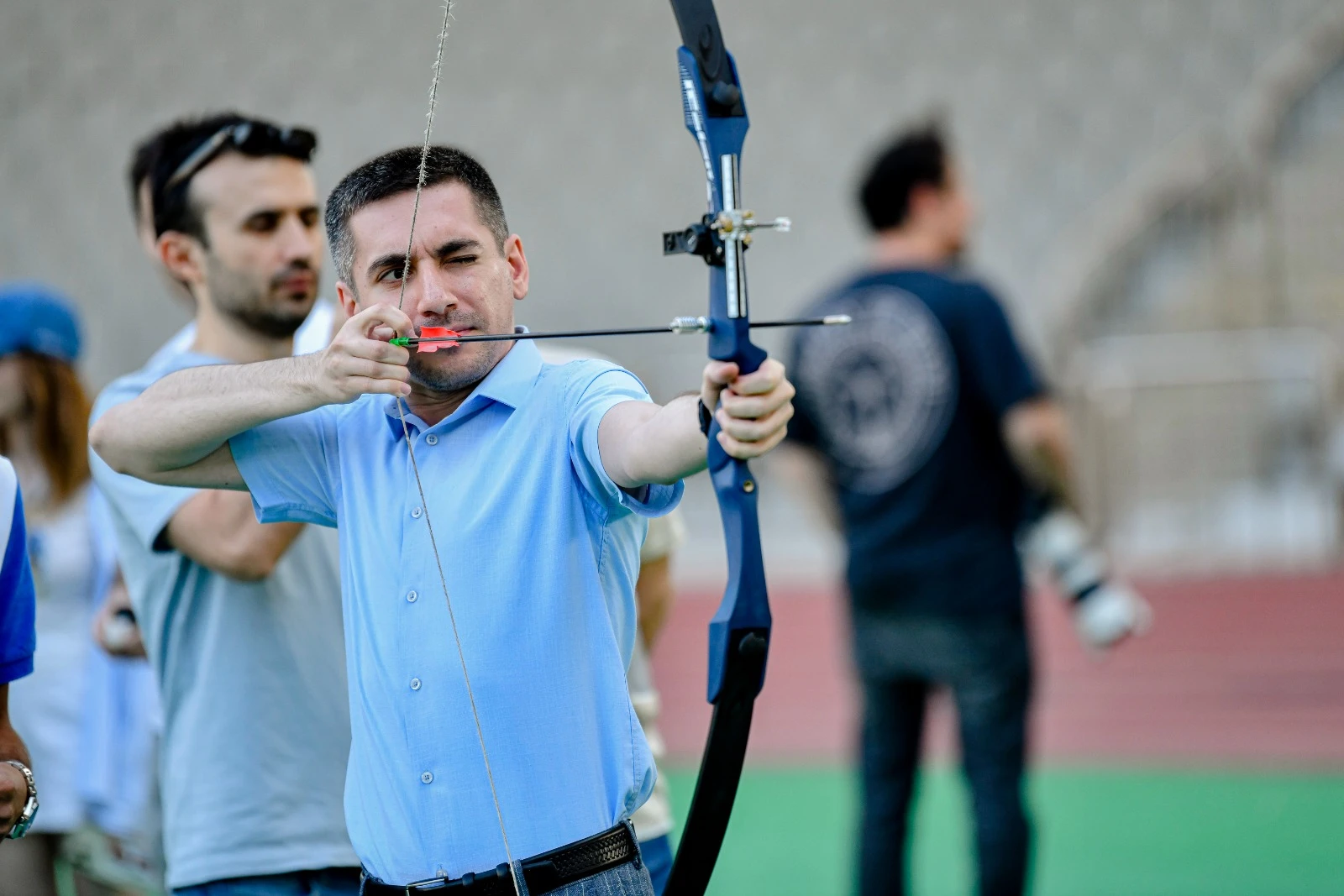 The Committee participated in the archery competition